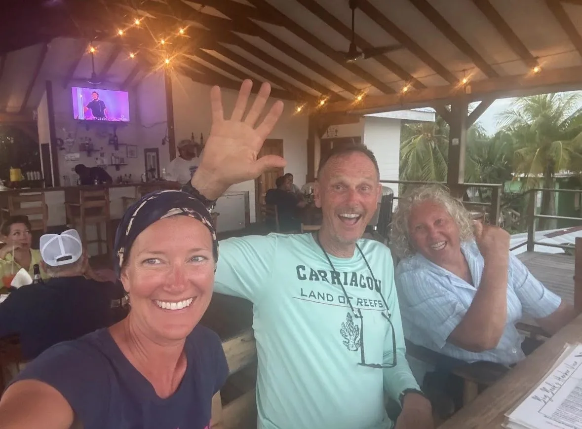 Friends enjoying an evening together in Placencia