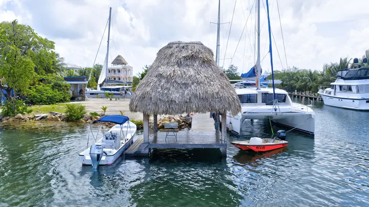 Palapa and yachts at the local waterfront