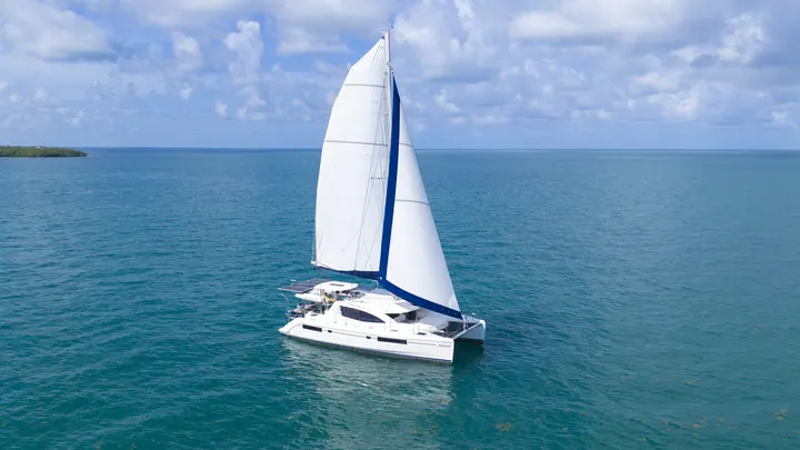 Sailing catamaran underway on Belize water