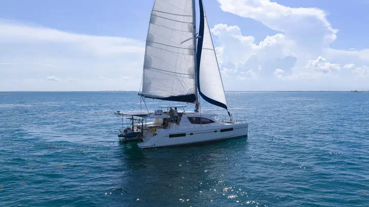Sailing catamaran underway on Belize water