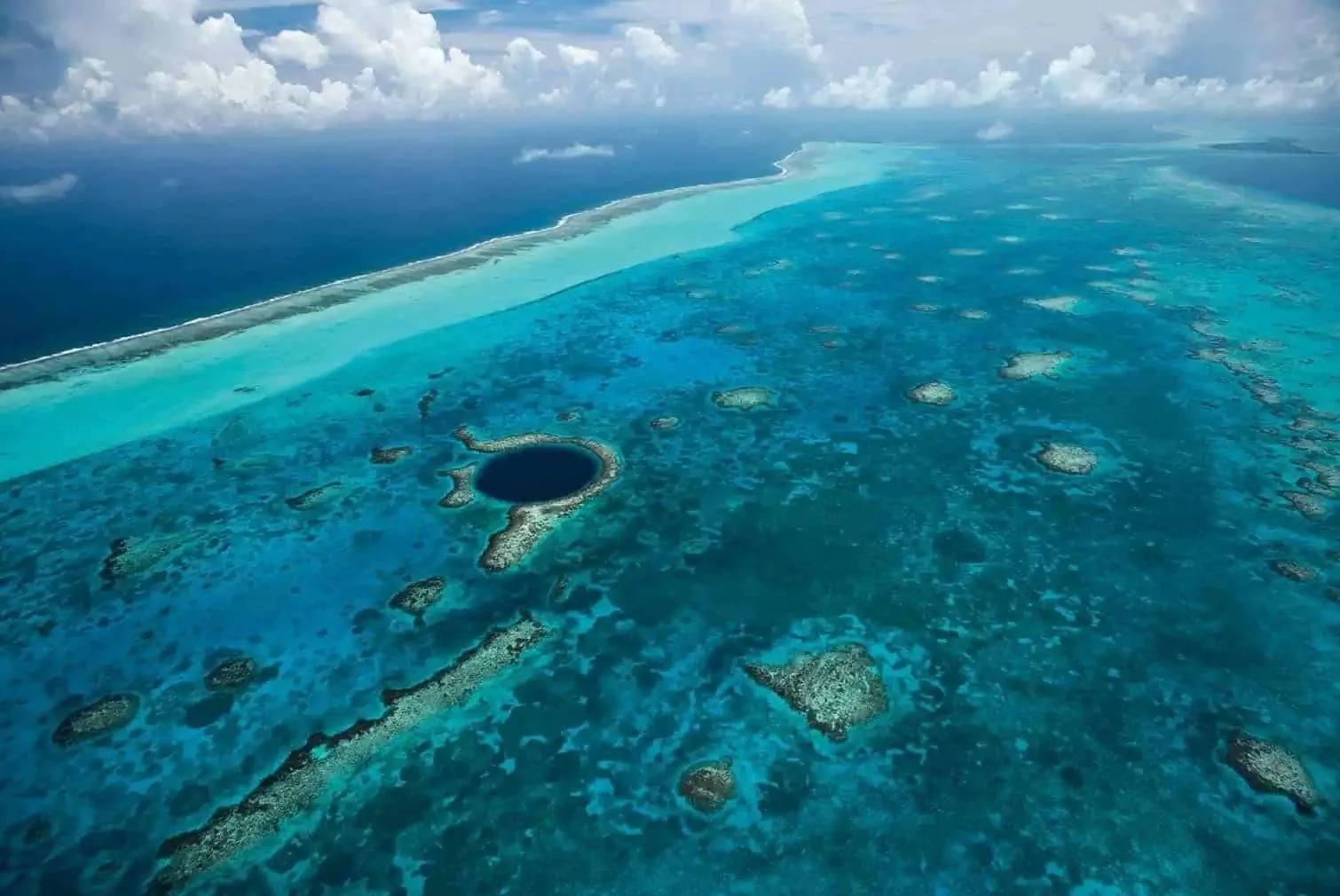 Aerial view of the Belize Barrier Reef and deep blue water