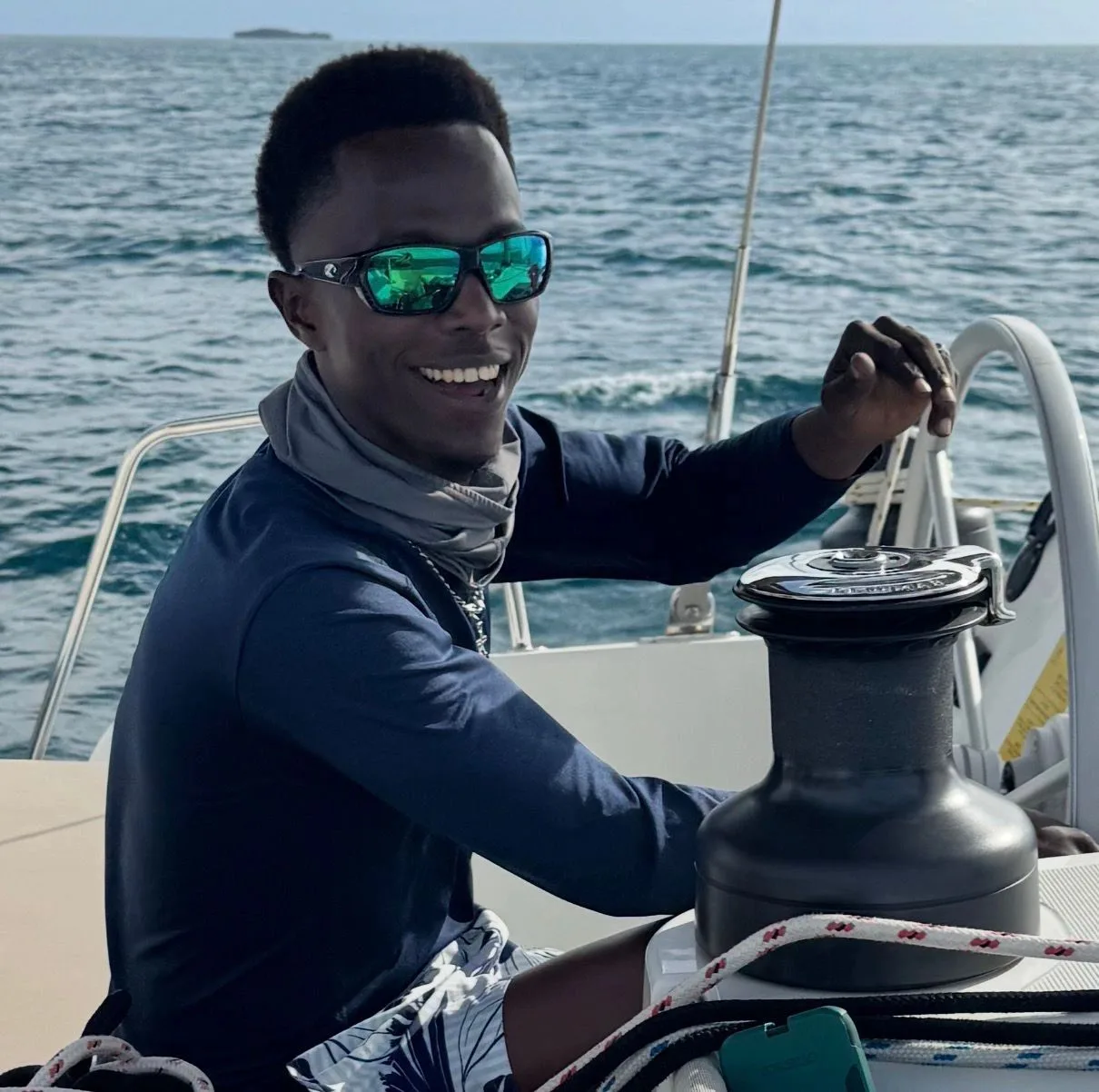Captain Terrell Tee working aboard a yacht