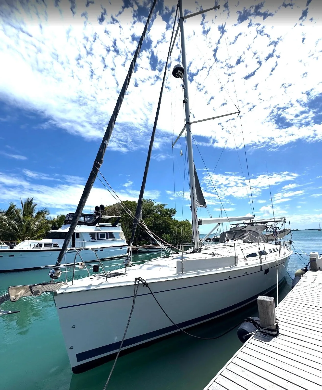 Courageux, a Hunter 49 sailing yacht, at the dock in Placencia