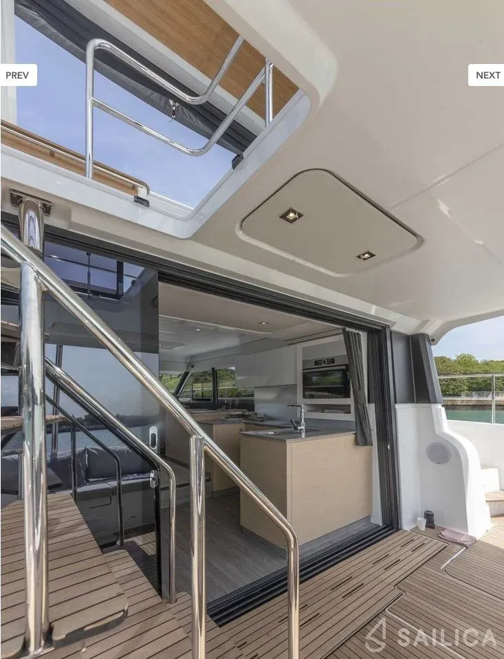 Fasching's aft entrance, galley and staircase to the flybridge