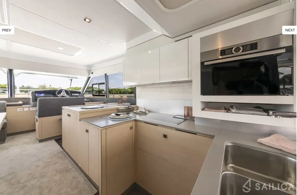 Full galley aboard Fasching with oven, stove and open salon beyond