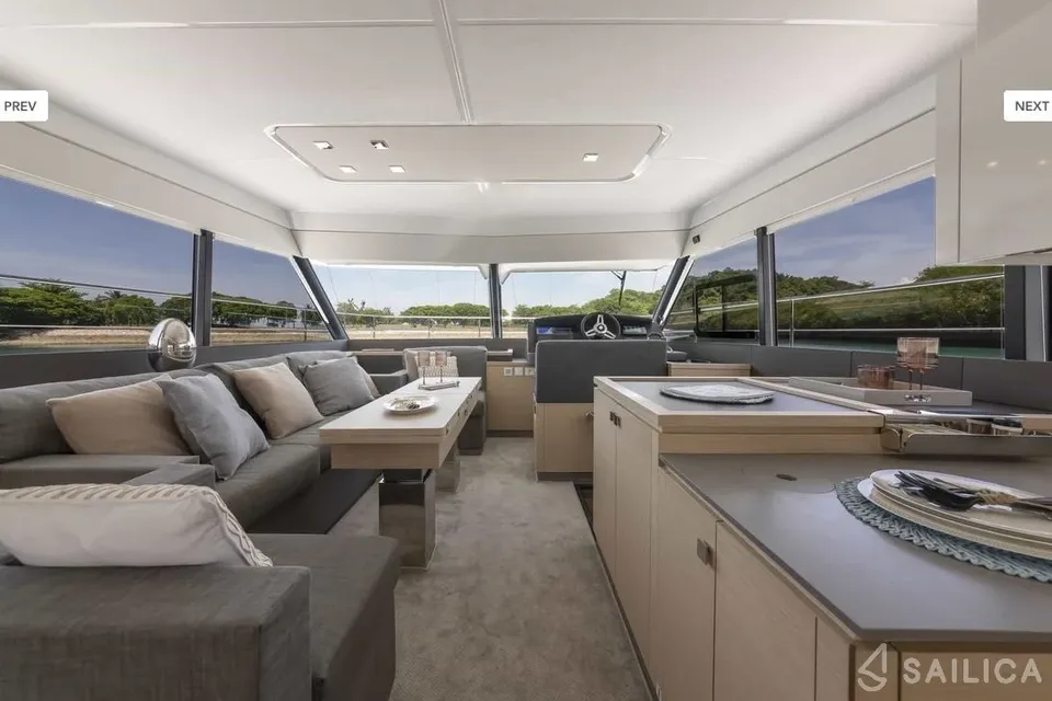 Fasching's light-filled salon with lounge seating and panoramic windows